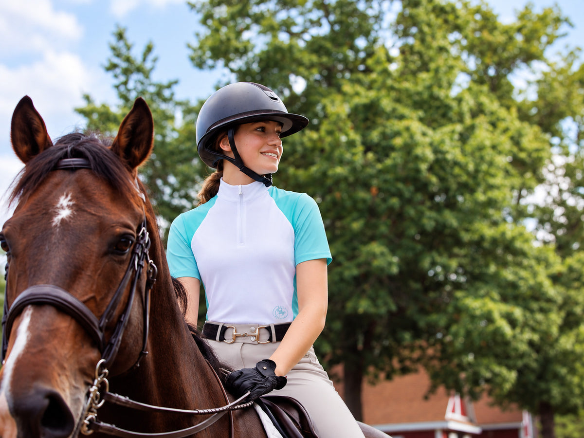 Ladies Claire Zip Collar Short Sleeve Show Shirt in Turquoise, rider on horse